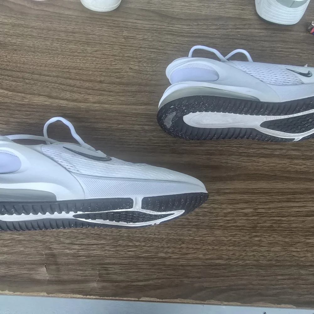 White Nike Sneakers with Black Swoosh